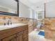Updated bathroom with tile flooring and a modern vanity at 7331 Westmoreland Dr, Sarasota, FL 34243