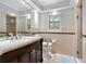 Clean bathroom, featuring a walk-in shower and updated fixtures at 7331 Westmoreland Dr, Sarasota, FL 34243