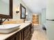 Elegant bathroom with double vanity and walk-in shower at 7331 Westmoreland Dr, Sarasota, FL 34243