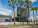 Contemporary building with gray facade and palm trees at 7331 Westmoreland Dr, Sarasota, FL 34243