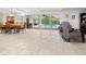 Dining room with pool view, adjacent to the kitchen at 7331 Westmoreland Dr, Sarasota, FL 34243