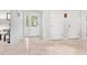 Bright entryway with tile floors and white doors at 7331 Westmoreland Dr, Sarasota, FL 34243