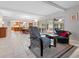 Gathering room with comfortable seating near kitchen and patio at 7331 Westmoreland Dr, Sarasota, FL 34243