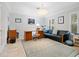 Bright home office features built-in shelving and hardwood floors at 7331 Westmoreland Dr, Sarasota, FL 34243