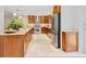 Modern kitchen with granite countertops and island seating at 7331 Westmoreland Dr, Sarasota, FL 34243