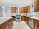Large kitchen with granite countertops and stainless steel appliances at 7331 Westmoreland Dr, Sarasota, FL 34243