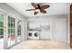 Laundry room with washer, dryer, and access to backyard at 7331 Westmoreland Dr, Sarasota, FL 34243