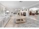 Open living room showcasing views to the dining room and backyard at 7331 Westmoreland Dr, Sarasota, FL 34243