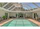 Spacious, screened pool and patio with plenty of seating at 7331 Westmoreland Dr, Sarasota, FL 34243