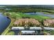 Condo building, showcasing location and landscaping at 8105 Grand Estuary Trl # 307, Bradenton, FL 34212