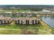 Condo building, showcasing location and landscaping at 8105 Grand Estuary Trl # 307, Bradenton, FL 34212