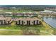 Condo building, showcasing location and landscaping at 8105 Grand Estuary Trl # 307, Bradenton, FL 34212