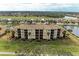 Luxury condo building with golf course and lake views at 8105 Grand Estuary Trl # 307, Bradenton, FL 34212