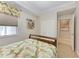 Guest bedroom with built-in closet and ensuite bathroom at 8105 Grand Estuary Trl # 307, Bradenton, FL 34212