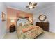 Spacious bedroom with a king-size bed and stylish decor at 8105 Grand Estuary Trl # 307, Bradenton, FL 34212