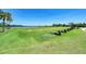 Driving range with multiple stations and lush grass at 8105 Grand Estuary Trl # 307, Bradenton, FL 34212
