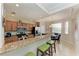 Modern kitchen with granite countertops and breakfast bar at 8105 Grand Estuary Trl # 307, Bradenton, FL 34212