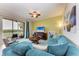 Condo living room with sectional sofa and water views at 8105 Grand Estuary Trl # 307, Bradenton, FL 34212