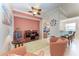 Condo living area with coral accent wall at 8105 Grand Estuary Trl # 307, Bradenton, FL 34212