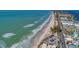 Aerial view of beach, ocean, and coastal town at 1125 Edgewater Cir # 13 Sec 1, Bradenton, FL 34209