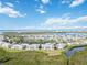 Aerial view of waterfront community with lush landscaping and multiple buildings at 1125 Edgewater Cir # 13 Sec 1, Bradenton, FL 34209