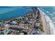 Aerial view of Anna Maria Island's coastline and town at 1125 Edgewater Cir # 13 Sec 1, Bradenton, FL 34209