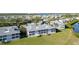 Aerial view of condo building near canal at 1125 Edgewater Cir # 13 Sec 1, Bradenton, FL 34209