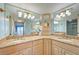 Double vanity bathroom with granite countertops at 1125 Edgewater Cir # 13 Sec 1, Bradenton, FL 34209