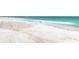 White sand beach with birds and ocean waves at 1125 Edgewater Cir # 13 Sec 1, Bradenton, FL 34209