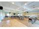 Spacious community room with ample seating and a large screen at 1125 Edgewater Cir # 13 Sec 1, Bradenton, FL 34209