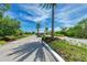 Community entrance with guardhouse and lush landscaping at 1125 Edgewater Cir # 13 Sec 1, Bradenton, FL 34209
