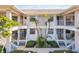Condo building showcasing four units with landscaping and walkways at 1125 Edgewater Cir # 13 Sec 1, Bradenton, FL 34209