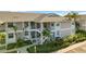 Two story condo building, stairs, landscaping at 1125 Edgewater Cir # 13 Sec 1, Bradenton, FL 34209