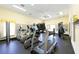 Fitness center featuring treadmills, ellipticals, and other cardio equipment at 1125 Edgewater Cir # 13 Sec 1, Bradenton, FL 34209