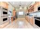 Well-equipped community kitchen with modern appliances at 1125 Edgewater Cir # 13 Sec 1, Bradenton, FL 34209