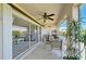 Spacious lanai with sliding glass doors, providing access to the outdoors and stunning views at 1125 Edgewater Cir # 13 Sec 1, Bradenton, FL 34209