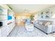 Open living room with white built-ins and light blue walls at 1125 Edgewater Cir # 13 Sec 1, Bradenton, FL 34209