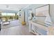 Living area with balcony access and water views at 1125 Edgewater Cir # 13 Sec 1, Bradenton, FL 34209