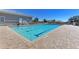 Inviting community pool with ample deck space for lounging at 1125 Edgewater Cir # 13 Sec 1, Bradenton, FL 34209