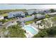 Aerial view of community pool and surrounding buildings at 1125 Edgewater Cir # 13 Sec 1, Bradenton, FL 34209