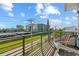 Relaxing balcony overlooking the neighborhood with seating for two at 171 Mckinley Dr, Sarasota, FL 34236