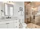 Modern bathroom with white vanity, frameless shower, and stylish fixtures at 171 Mckinley Dr, Sarasota, FL 34236