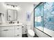 Contemporary bathroom with blue geometric tile and a bathtub at 171 Mckinley Dr, Sarasota, FL 34236