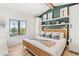 Spacious bedroom with a king bed and built-in storage at 171 Mckinley Dr, Sarasota, FL 34236