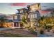 Modern coastal home with a spiral staircase and a two-car garage at 171 Mckinley Dr, Sarasota, FL 34236