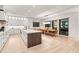 Spacious kitchen with island, stainless steel appliances, and white cabinetry at 171 Mckinley Dr, Sarasota, FL 34236