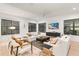 Bright living room with comfortable seating, large TV, and stylish decor at 171 Mckinley Dr, Sarasota, FL 34236