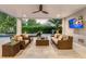 Covered patio with comfortable seating and a view of the pool at 171 Mckinley Dr, Sarasota, FL 34236