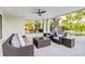 Outdoor patio with seating area, ping pong table, and pool access at 171 Mckinley Dr, Sarasota, FL 34236