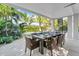 Outdoor dining area with large table and pool view at 171 Mckinley Dr, Sarasota, FL 34236